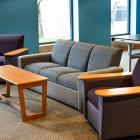 blue lounge with couches and chairs